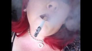 pvc mistress smoking