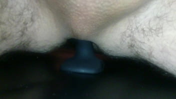 mistress instructs man on butt plug anal stretching
