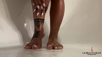 naked girl feet and hand handcuffed